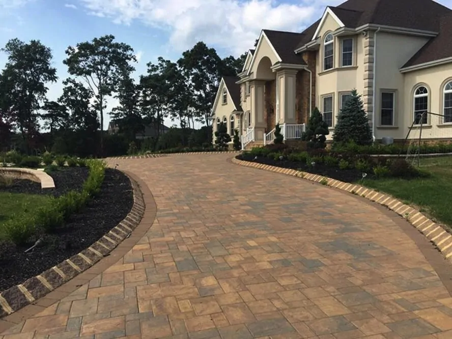 Custom brick paver driveway installed by JS Masonry