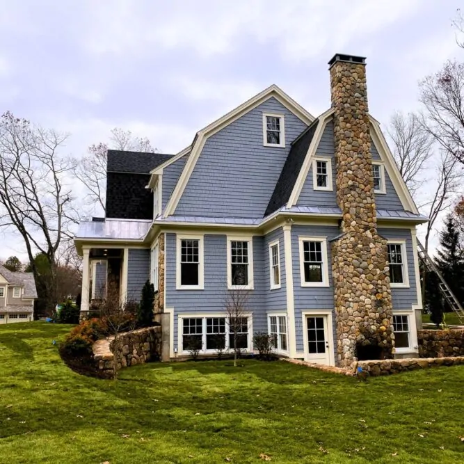 JS Masonry completed home with stone chimney in Massachusetts